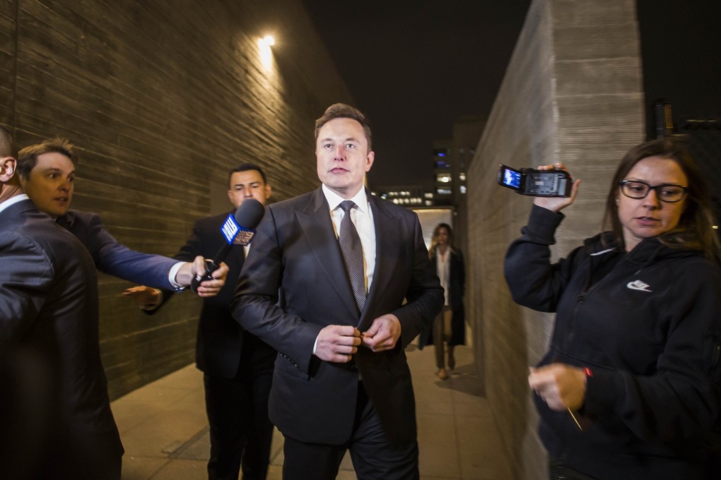 Elon Musk, chief executive officer of Tesla Inc. leaves the US District Court, Central District of California through a back door in Los Angeles, U.S. on December 3, 2019 in Los Angeles, California. Apu Gomes/Getty Images/AFP
