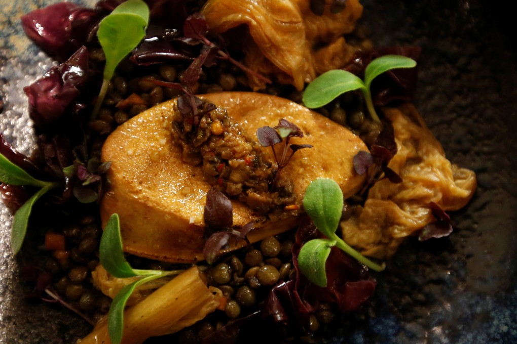 A dish with “naturally fatty” foie gras, made from geese fed with bacteria to stimulate the fattening of the liver, seen at Solides restaurant in Toulouse, France on November 29. Photo: Reuters