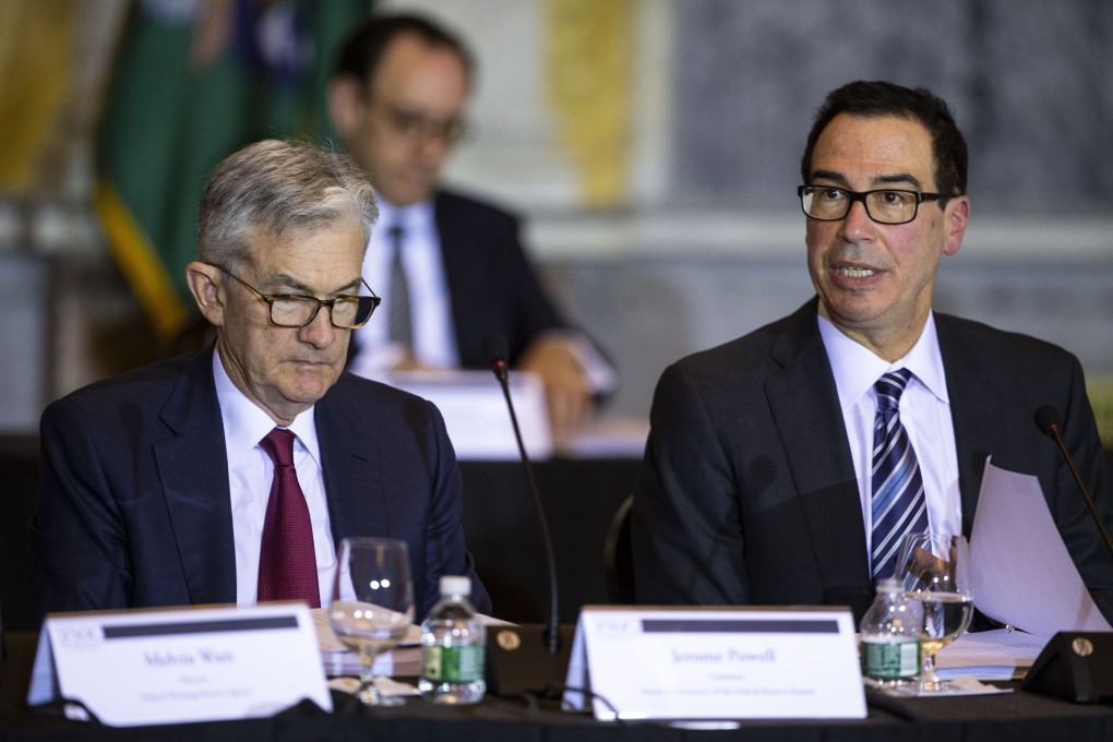 US Treasury Secretary Steven Mnuchin (right) with US Federal Reserve Chairman Jerome Powell (left) during a Financial Stability Oversight Council (FSOC) meeting at the US Treasury in Washington, DC on Wednesday, December 19, 2018. Photo: Bloomberg