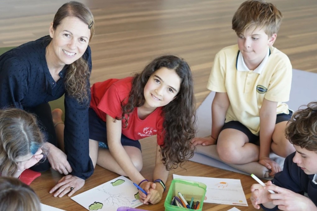 Mary Fitzgerald, founder and director of a company that offers mindfulness and meditation programmes, works with a group of children. “When they are more observant of their thoughts and feelings, kids can choose how to react and behave,” she says. Photo: Rebecca Fitzgerald