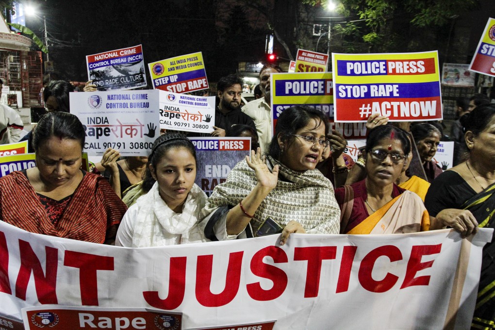 Protesters march in Kolkata, India, on Wednesday to demand justice in the case of a veterinarian who was gang-raped and killed last week. Photo: AP
