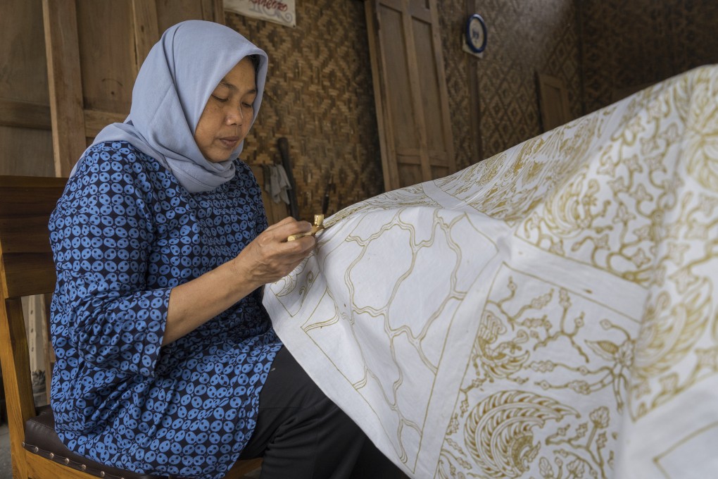 Batik crafter Imaroh works on a design in Imogiri, Yogyakarta, Indonesia. She has been making batik since she was 10 years old. Photo: Hendra Nurdiyansyah