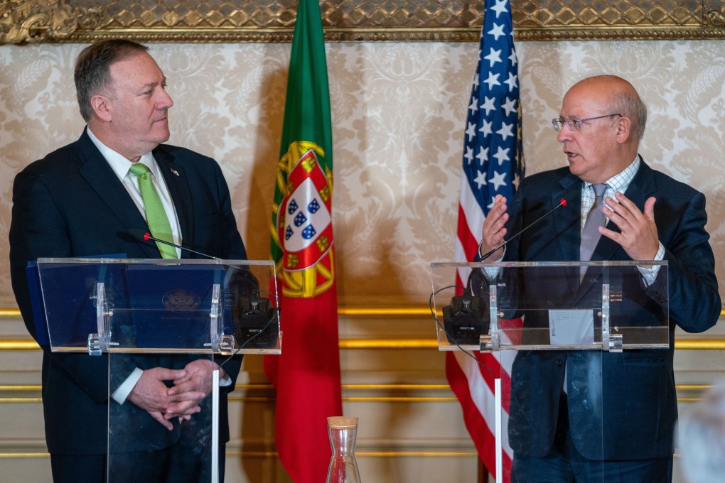 Portuguese Foreign Minister Augusto Santos Silva (right) and US Secretary of State Mike Pompeo attend a joint press conference in Lisbon on Thursday. Photo: Ron Przysucha/US Department of State via dpa