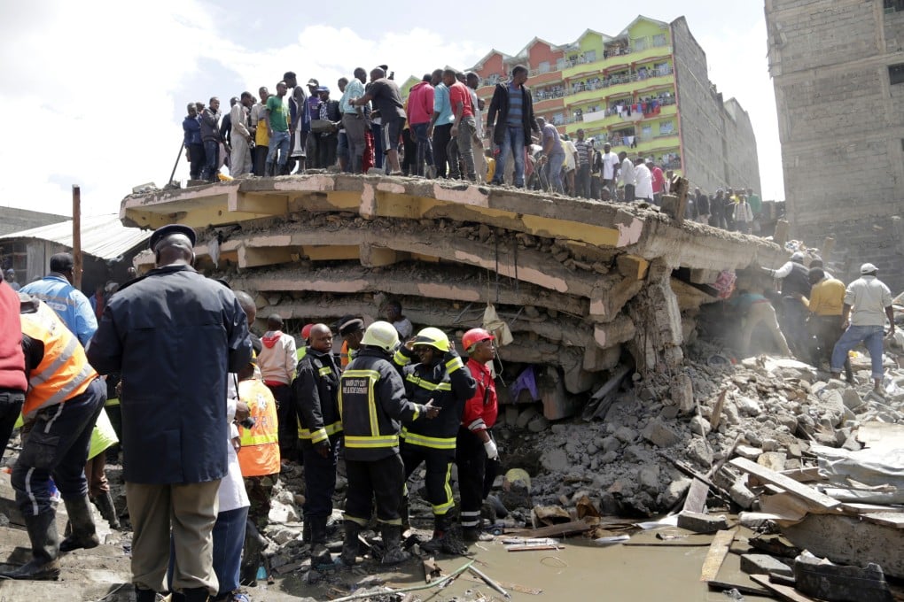 Rescuers attend the scene of a building collapse in a neighbourhood of Nairobi, Kenya. Photo: AP
