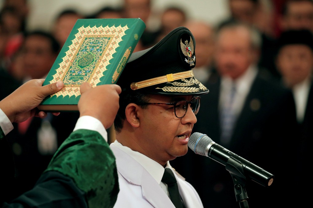 Anies Baswedan is sworn in as the governor of Jakarta. Photo: Reuters