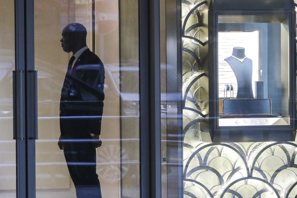 A security guard at a jewellery shop in Central. Photo: Edmond So
