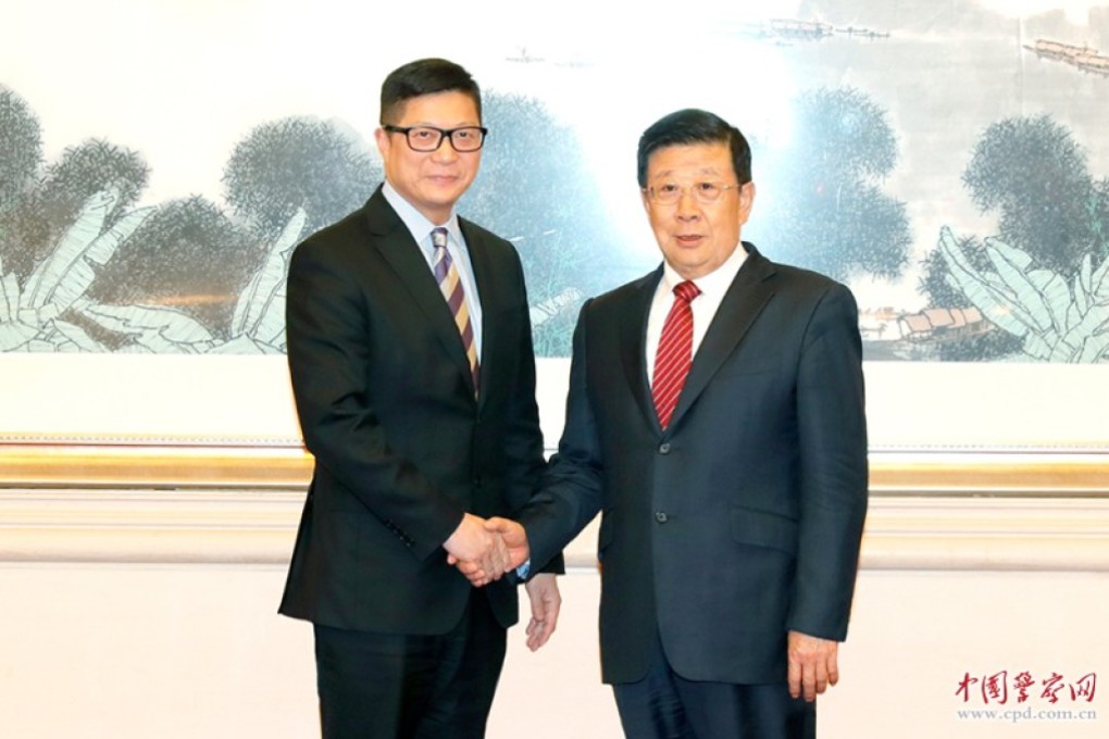 Hong Kong police chief Chris Tang (left) meets public security minister Zhao Kezhi in Beijing. Photo: Weibo