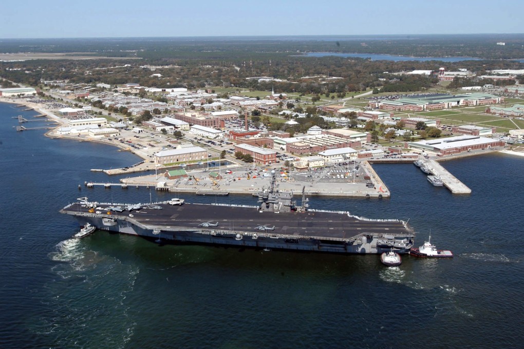 An aerial view of the USS John F Kennedy arriving for a port visit at Naval Air Station Pensacola. Photo: Handout via EPA-EFE