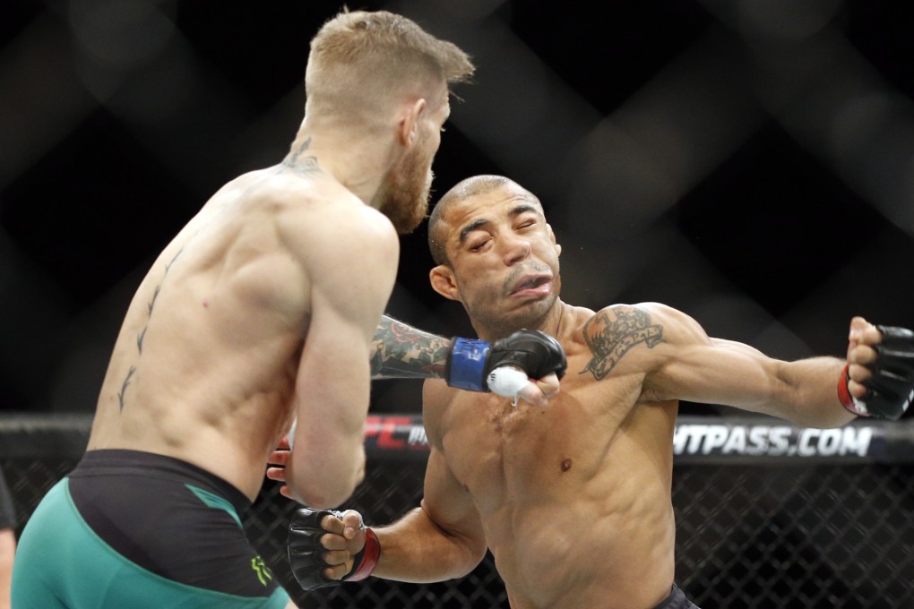 Conor McGregor knocks out then-champion Jose Aldo in 13 seconds during UFC 194 featherweight title bout in 2015. Photo: AP