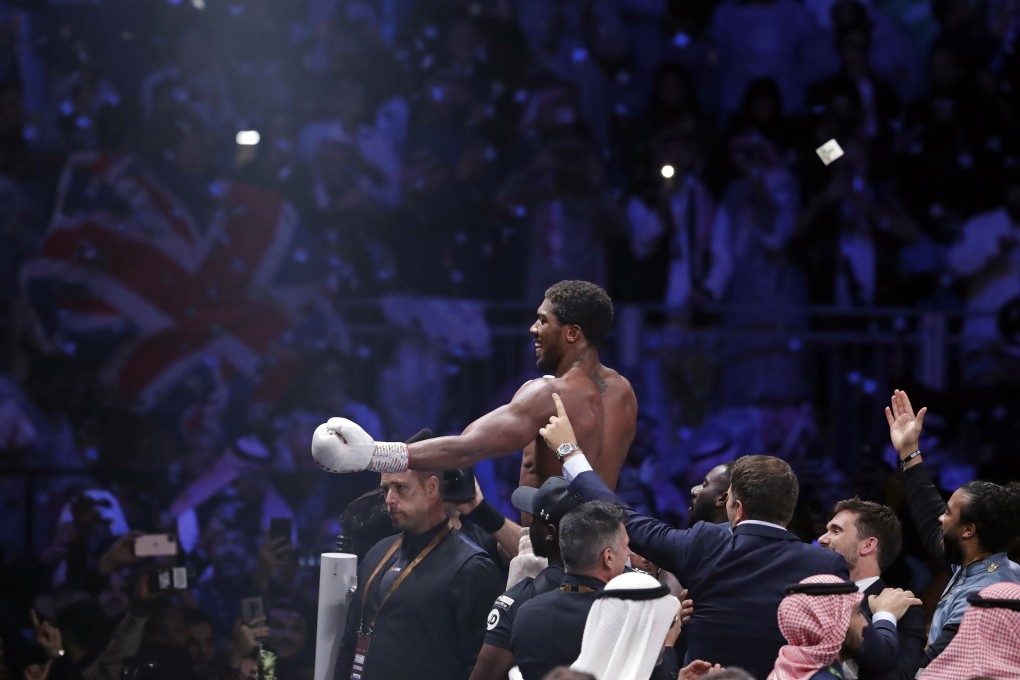 Britain’s Anthony Joshua celebrates after beating Andy Ruiz Jnr to reclaim his heavyweight world titles. Photo: AP