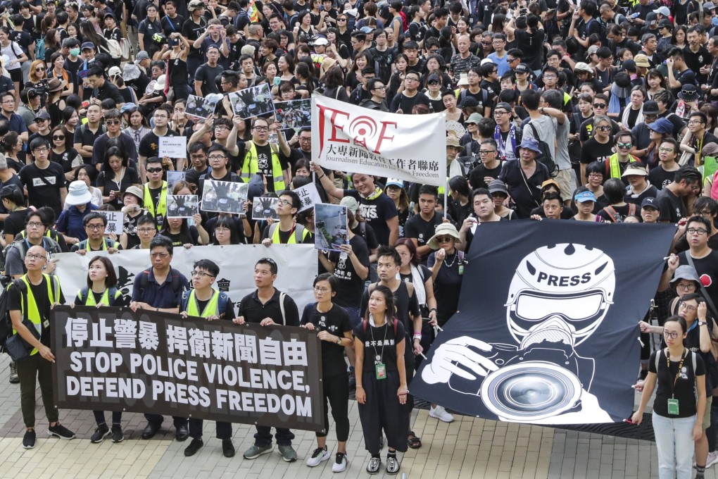 In July, Hong Kong journalists, press photographers, journalism school teachers and commentators took part in a silent march against police violence. Photo: Edmond So
