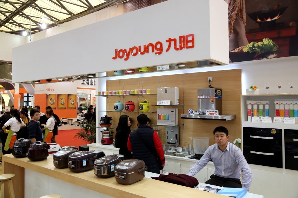 JS Global showcases its Joyoung product range during the Appliance and Electronics World Expo in Shanghai, China in March 2015. Photo: Imaginechina