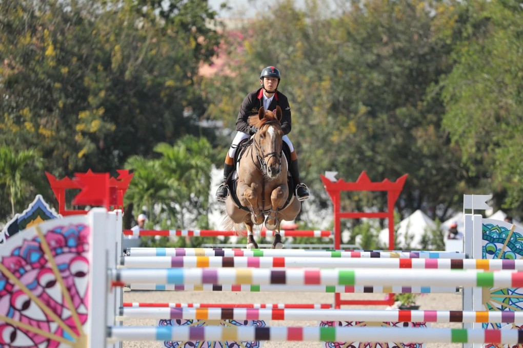 Kenneth Cheng competes aboard his horse Tyson AZ. Photos: HKJC