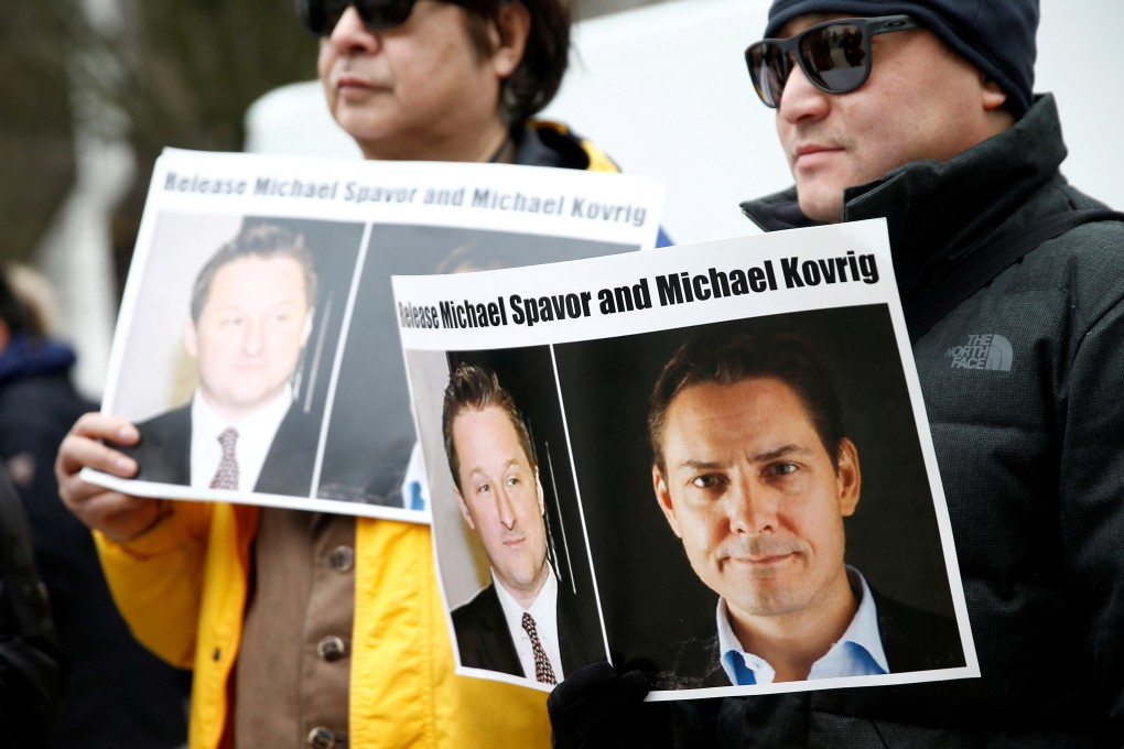 Supporters call for the release of Michael Spavor and Michael Kovrig outside a court hearing for Meng Wanzhou in Vancouver earlier this year. Photo: Reuters