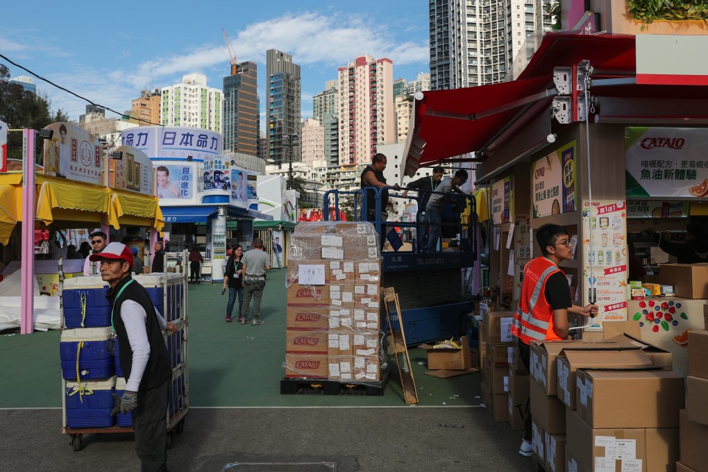 Workers get stalls ready for the 2019 Hong Kong Brands and Products Expo, which opens on Tuesday. Photo: Sam Tsang