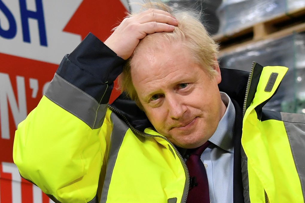 Britain’s Prime Minister Boris Johnson speaks during a campaign visit to Fergusons Transport in the town of Washington in Britain on Monday. Photo: Reuters