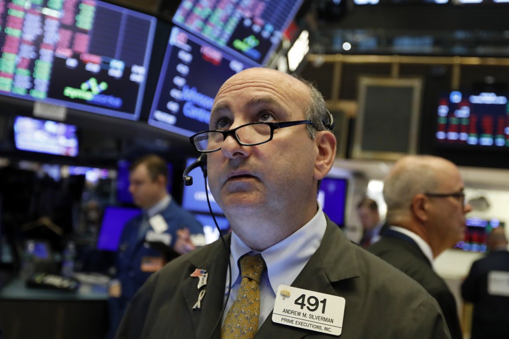 A trader on the floor of the New York Stock Exchange on August 13. So much hangs upon the wealth effect and inflated asset values created by the equity bull market. Photo: AP