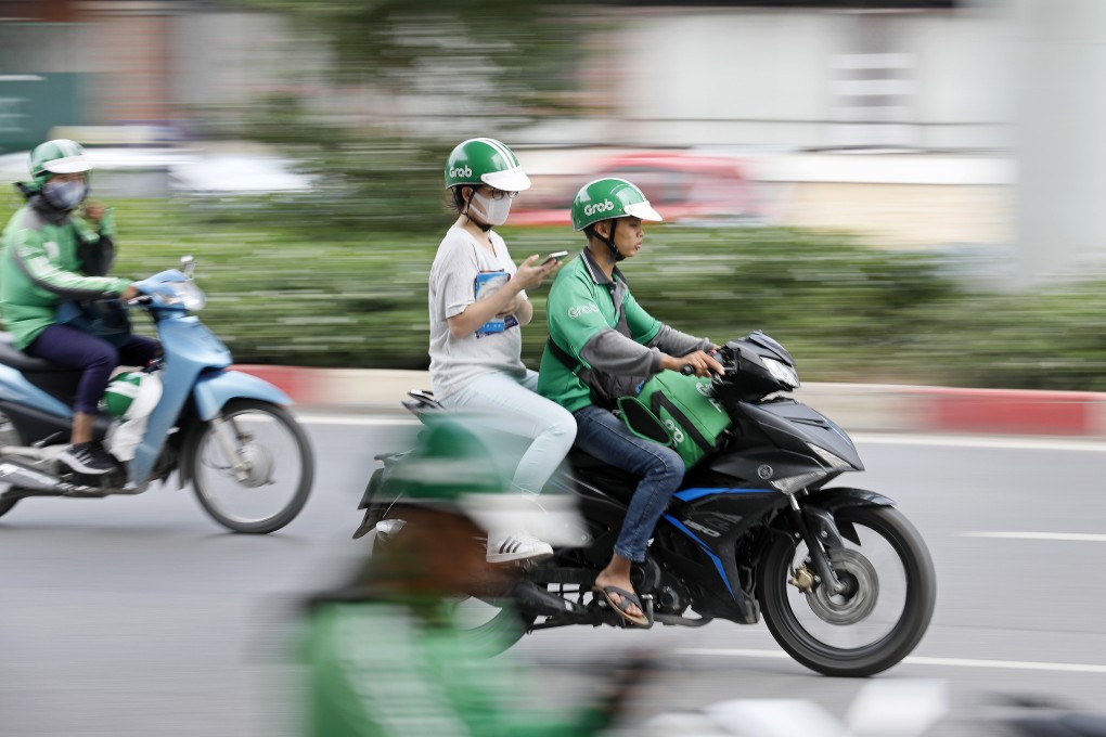 Grab’s food and financial services now account for more than 50 per cent of the value of sales transacted across the platform. Photo: EPA-EFE