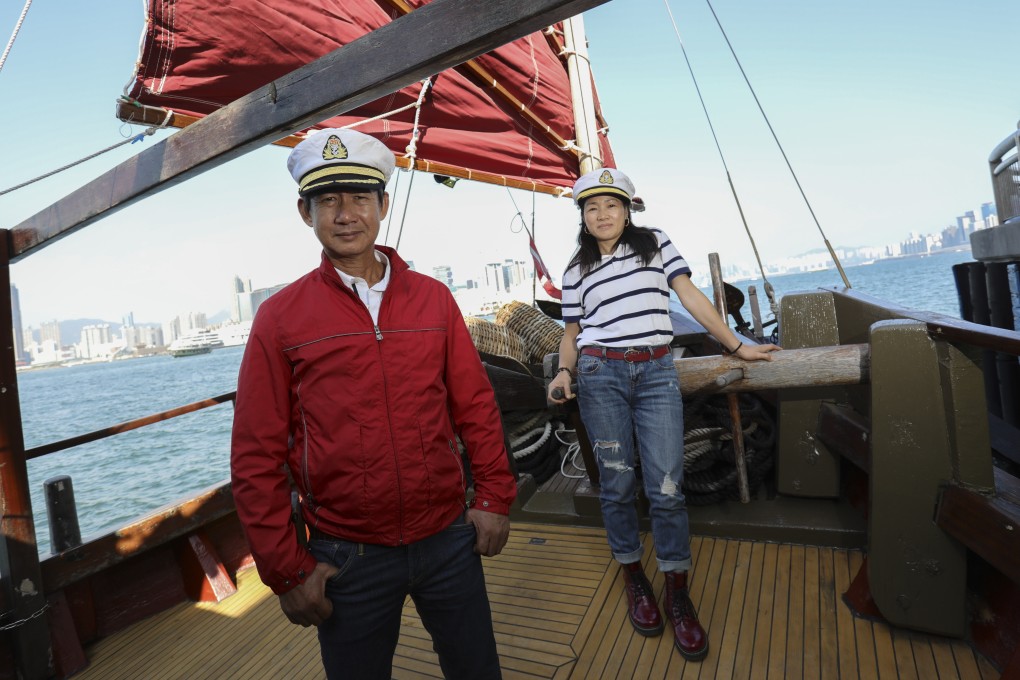 David Kwok (left) and his wife on board the Hong Kong Pioneer, a traditional shrimp trawler that Kwok saved from the scrapyard in Tuen Mun in 2007 and fully restored into a sailing junk. Photo: May Tse