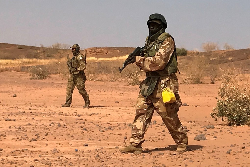 Nigerien commandos simulate a raid on a militant camp. File photo: AFP
