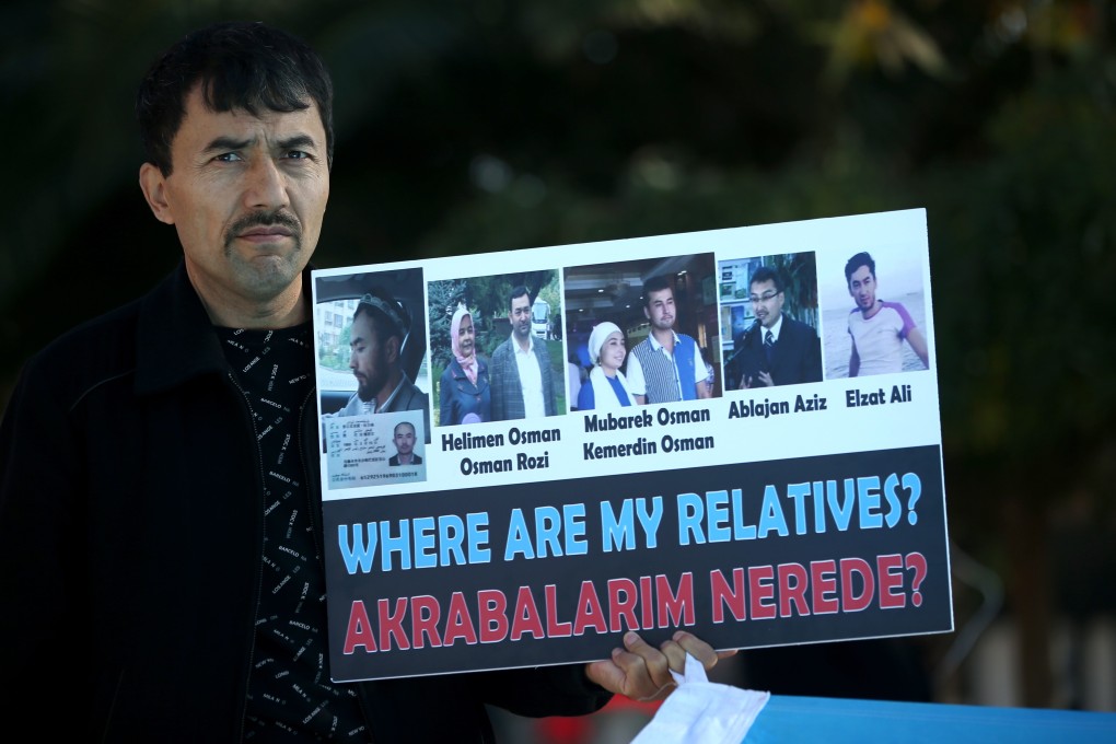 A protester in Istanbul draws attention to the treatment of Uygurs and other Muslim minorities in Xinjiang. Photo: EPA-EFE