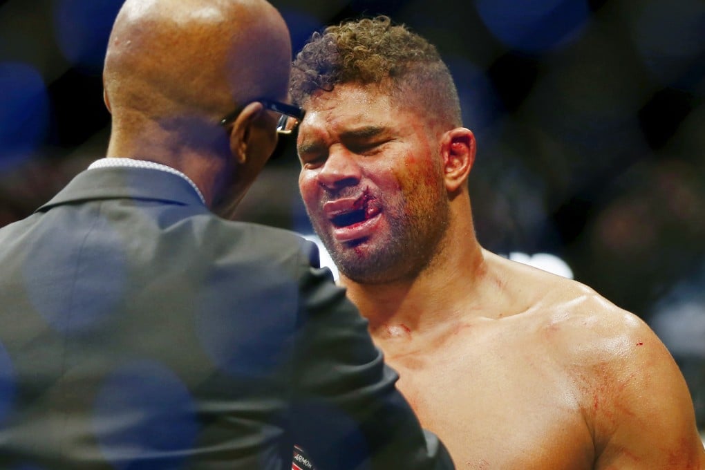 Alistair Overeem is tended to after an injury to his lip following his loss to Jairzinho Rozenstruik. Photos: USA TODAY Sports