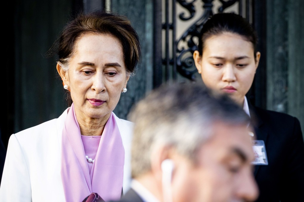 Myanmar's State Counsellor Aung San Suu Kyi (left) leaves the Peace palace in The Hague on Friday. Photo: AFP