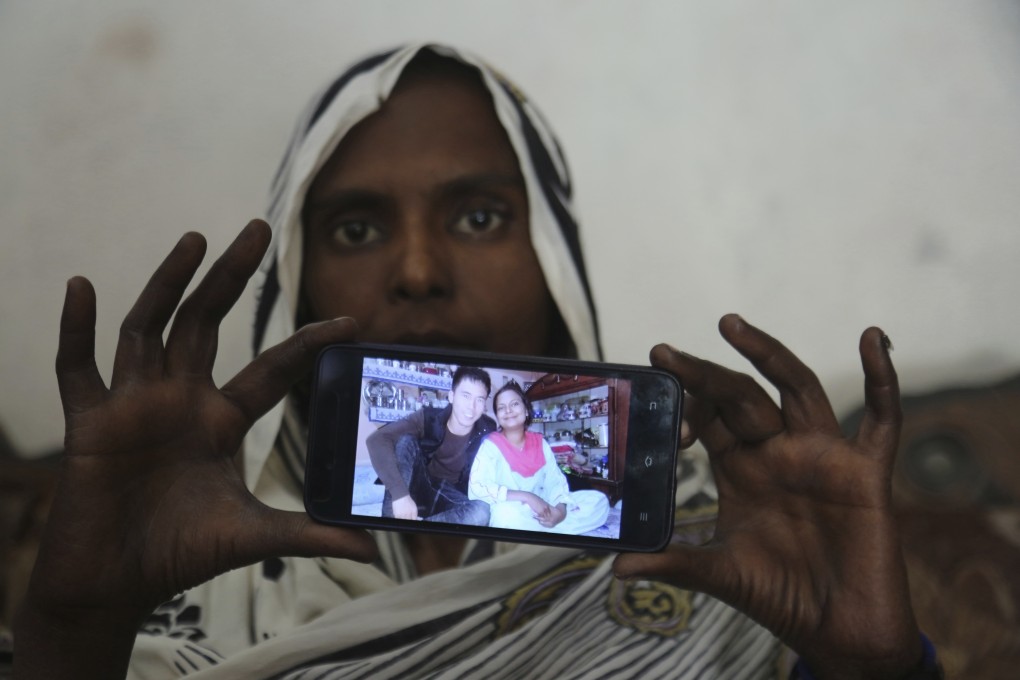 Samiya David shows her picture with Chinese husband, in Gujranwala, Pakistan. Photo: AP