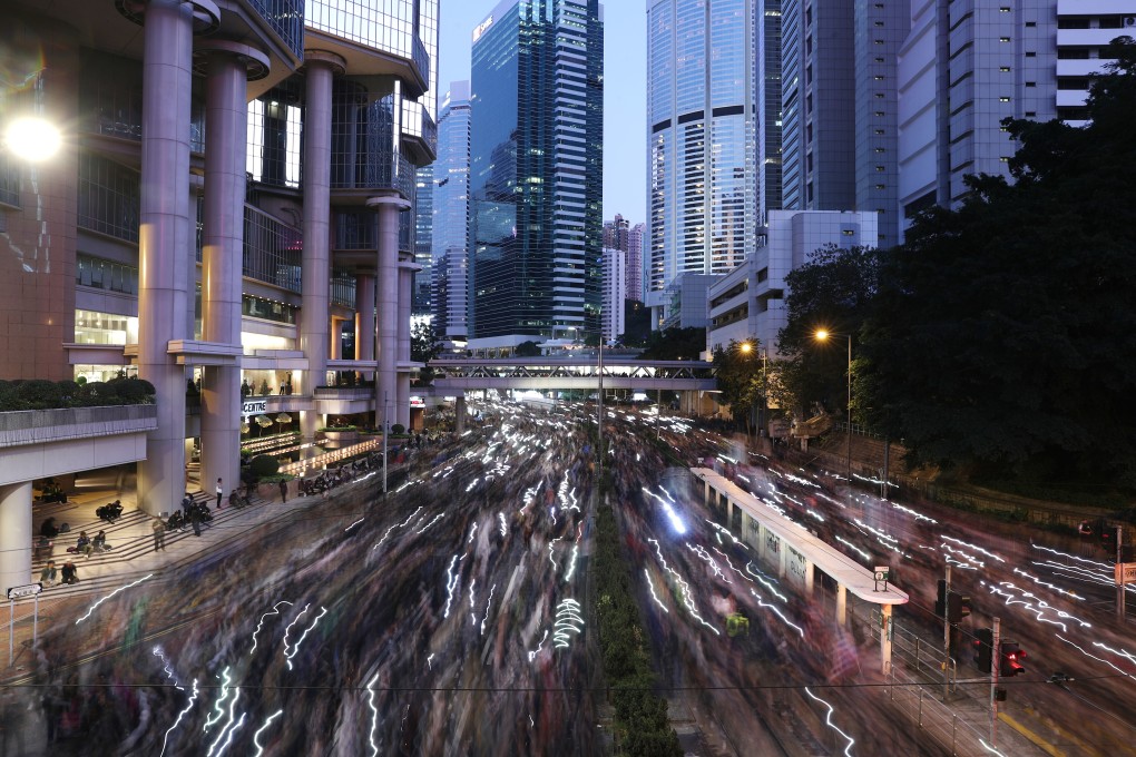 Protesters march from Causeway Bay to Central on the eve of the six-month anniversary of the unrest in Hong Kong on December 8. Photo: Sam Tsang