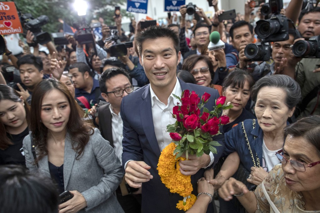 Thanathorn Juangroongruangkit, leader of the antimilitary Future Forward Party, surrounded by his supporters. Photo: AP Photo
