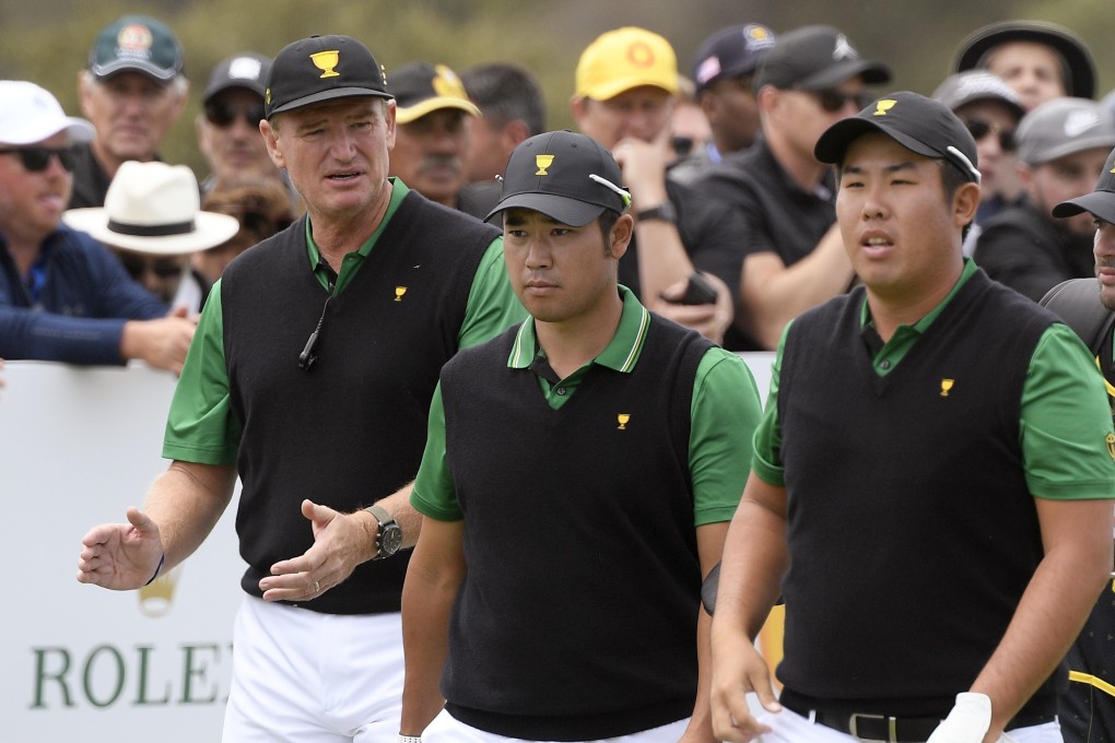 International team captain Ernie Els (left) encourages Hideki Matsuyama of Japan and Byeong Hun An of South Korea. Photo: AP