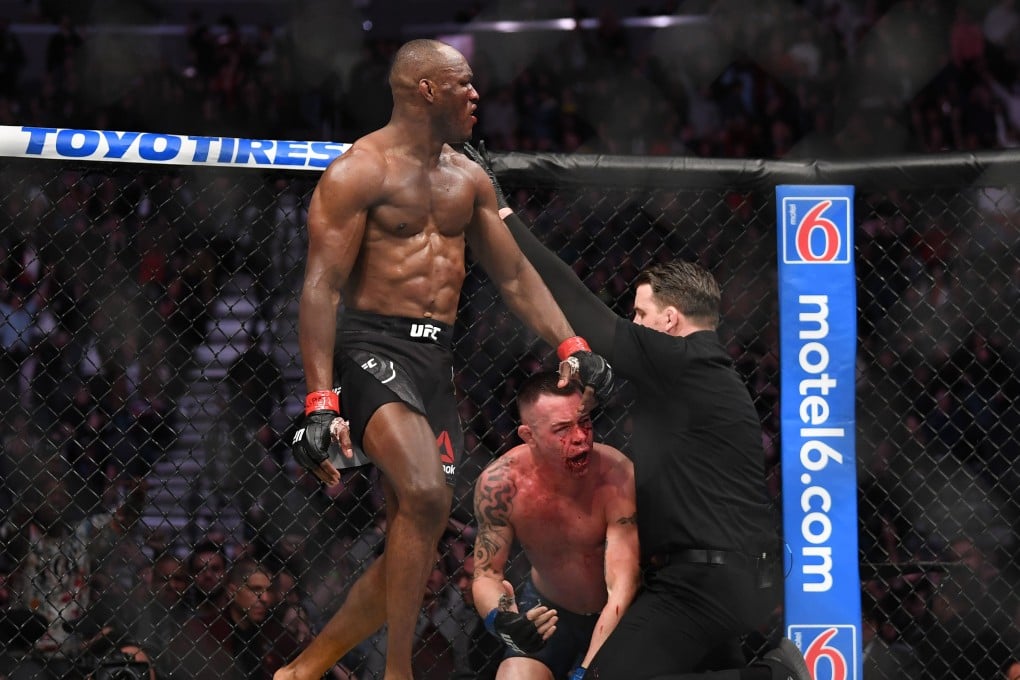 Kamaru Usman walks off as referee Marc Goddard stops his bout against Colby Covington at UFC 245. Photo: USA TODAY Sports