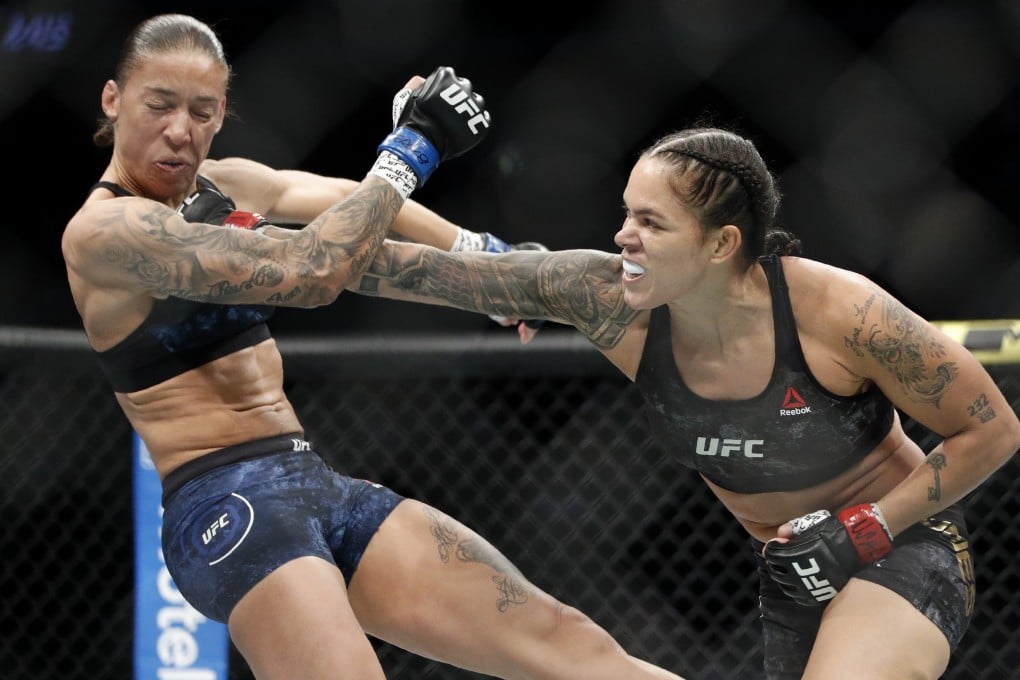 Amanda Nunes hits Germaine de Randamie at UFC 245. Photo: AP