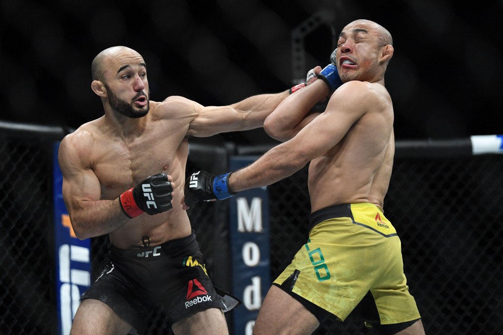 Marlon Moraes (left) lands a big left hand on Jose Aldo. Photo: USA Today