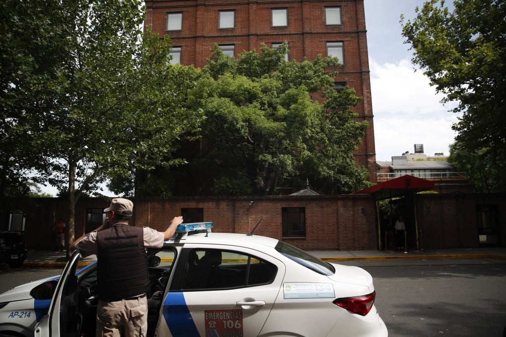A police officer stands in front of the Faena Art Hotel in Buenos Aires. Photo: AP Photo