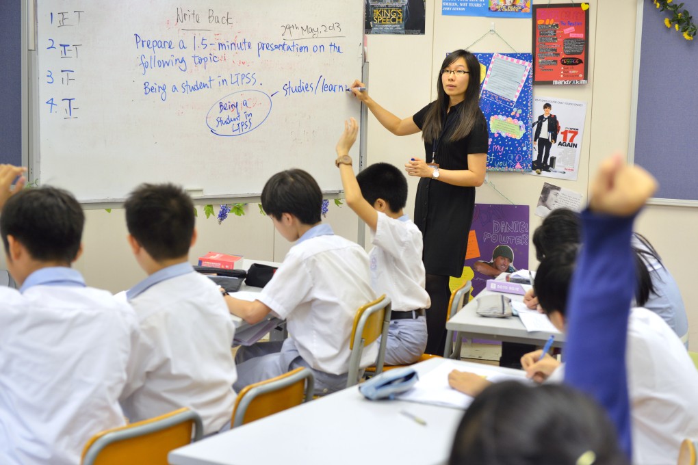 A teacher leads an English class using methods that encourage student participation, at a secondary school in Tai Po in May 2013. Photo: SCMP