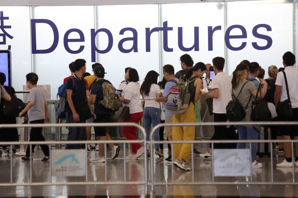 Official figures show that passenger numbers at Hong Kong International Airport experienced their steepest drop Dickson Lee