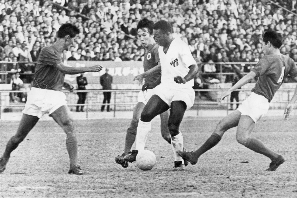 Pele (in white), of the Brazilian football team Santos, in action against the Hong Kong League XI at the Hong Kong Stadium, on December 13, 1970. Photo: SCMP