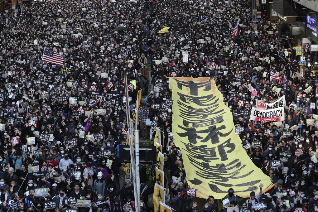Hongkongers who live and work on the mainland are finding themselves caught in the middle over their city’s political crisis. Photo: Robert Ng