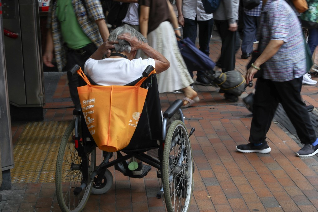 An elderly woman sitting in her wheelchair in Sham Shui Po. Photo: Edmond So