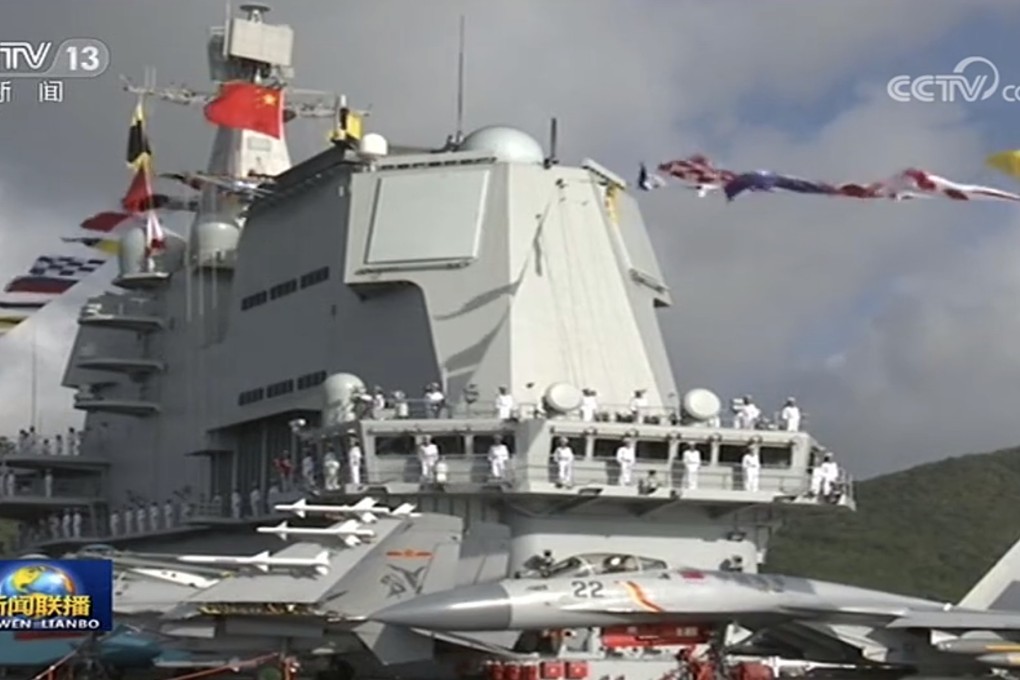 The carrier officially entered into service after a ceremony in Hainan on Tuesday. Photo: Handout