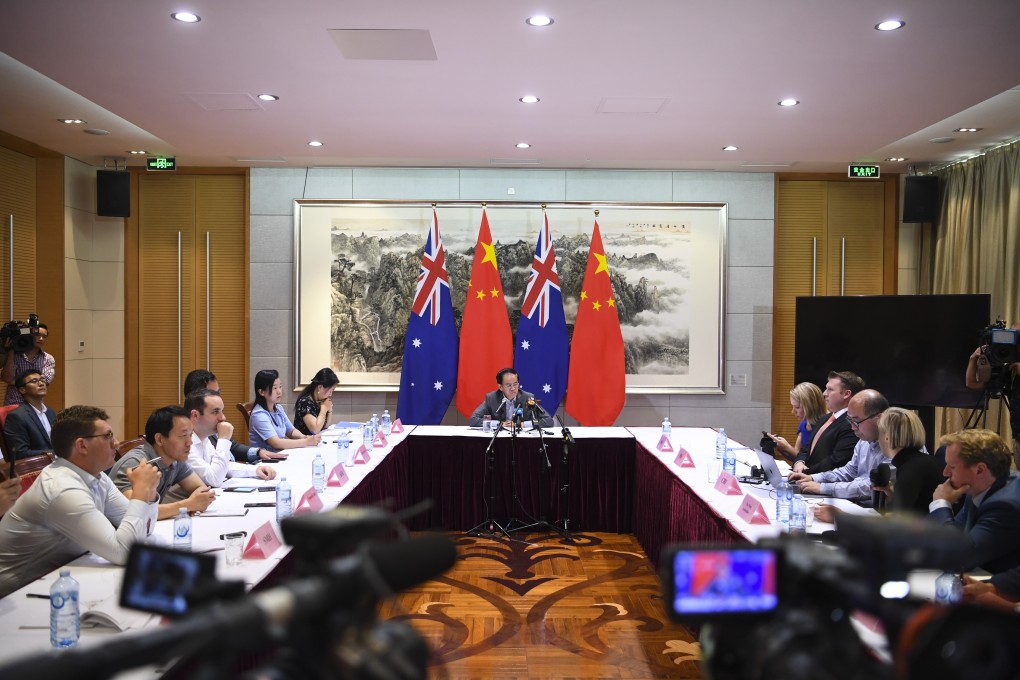 Cheng Jingye addresses media during the press conference at his residence in Canberra on Thursday. Photo: EPA-EFE