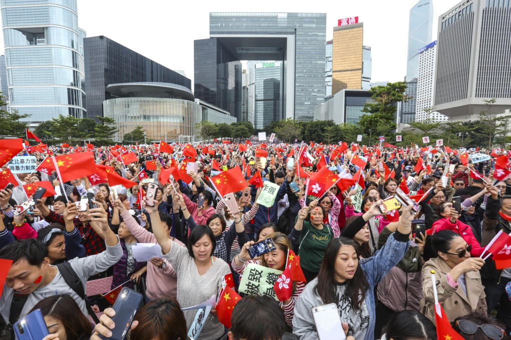 Pro-China demonstrators rally at Hong Kong’s Tamar Park on December 15. Photo: May Tse