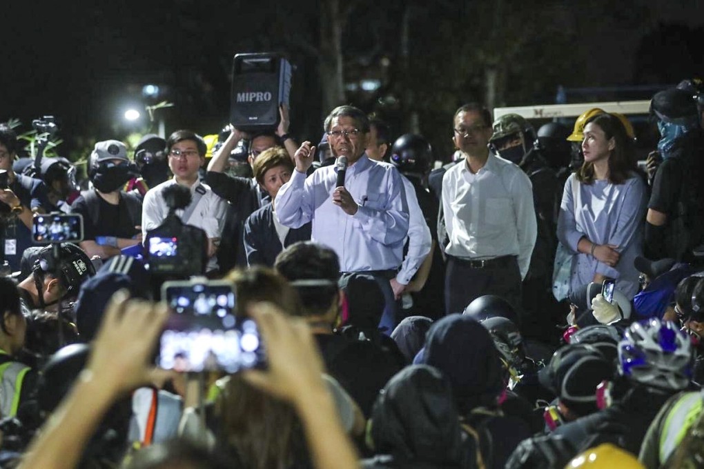 Rocky Tuan tries to defuse tensions during the second day of protesters’ occupation of Chinese University’s campus, which ran from November 11 to 15. Photo: Sam Tsang