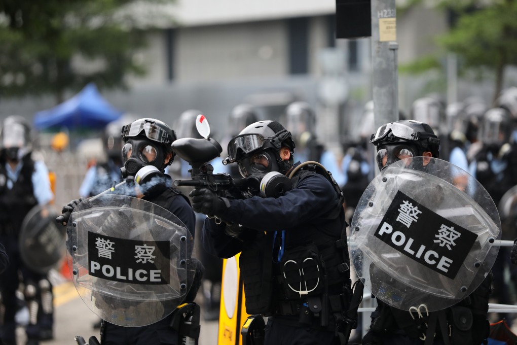 Riot officers on Harcourt Road in Admiralty. Photo: Sam Tsang