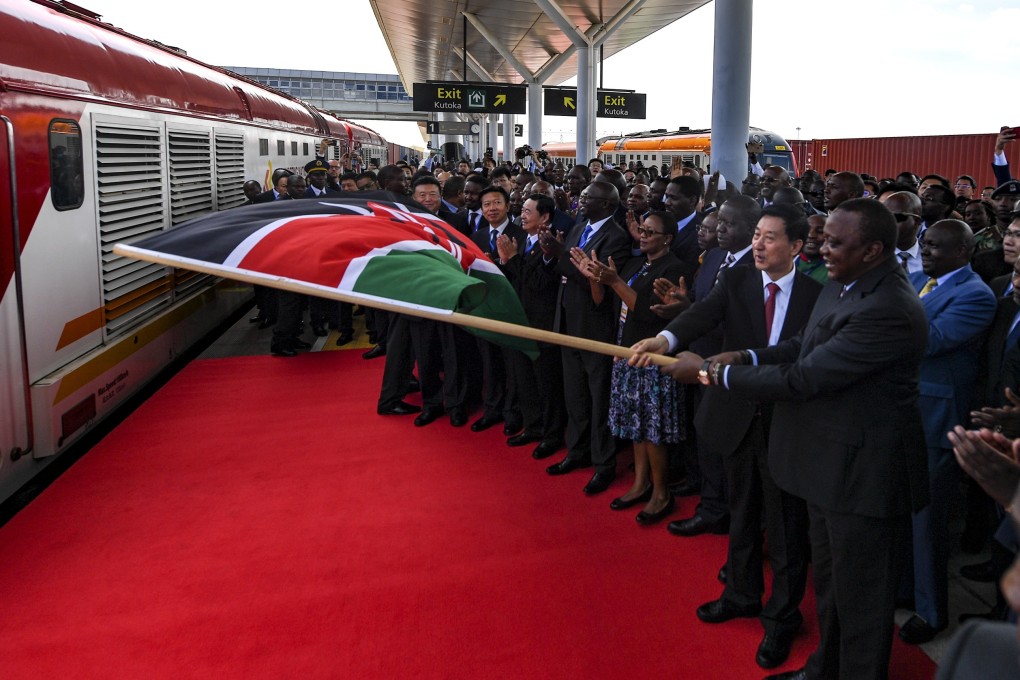 Kenyan President Uhuru Kenyatta and Chinese envoy Wang Yong launch a new rail freight service in Nairobi on Tuesday. Photo: Xinhua