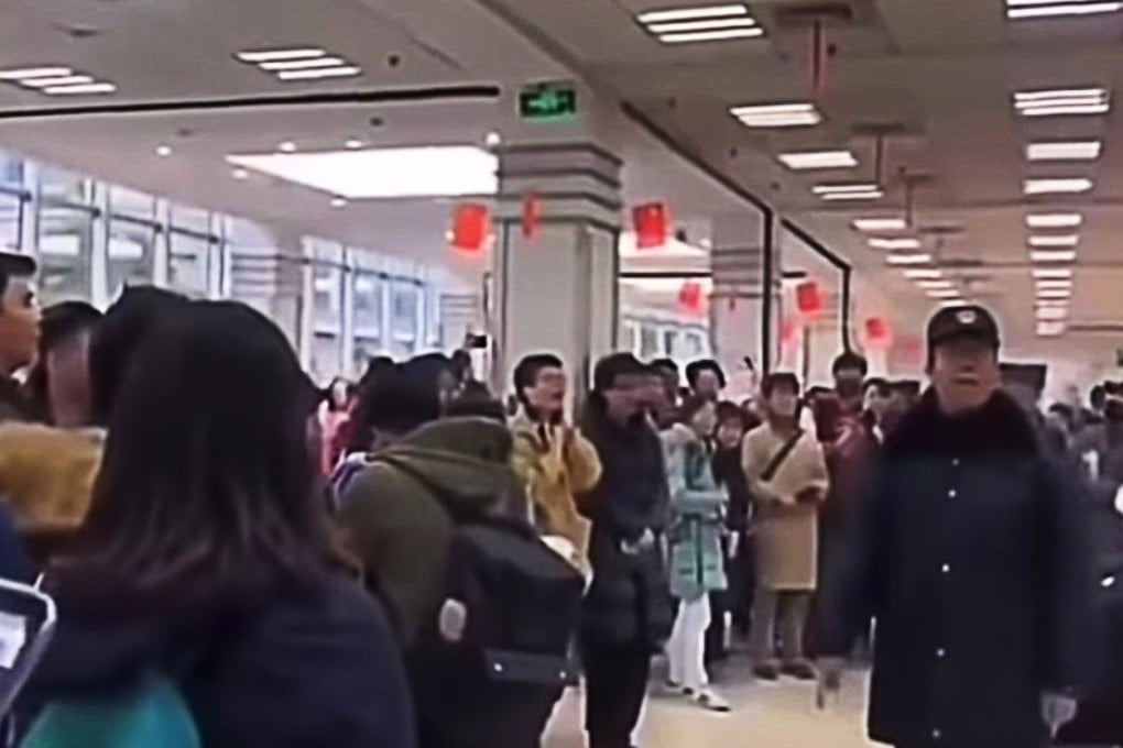 A screengrab of the censored video clip showing dozens of students taking part in a flash mob demonstration against changes to Fudan University’s charter. Photo: YouTube