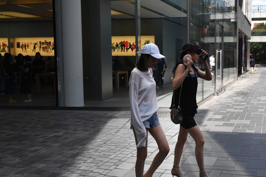Single young workers, mostly females, in China’s smaller cities are the new driver of China’s consumption story. Photo: AFP