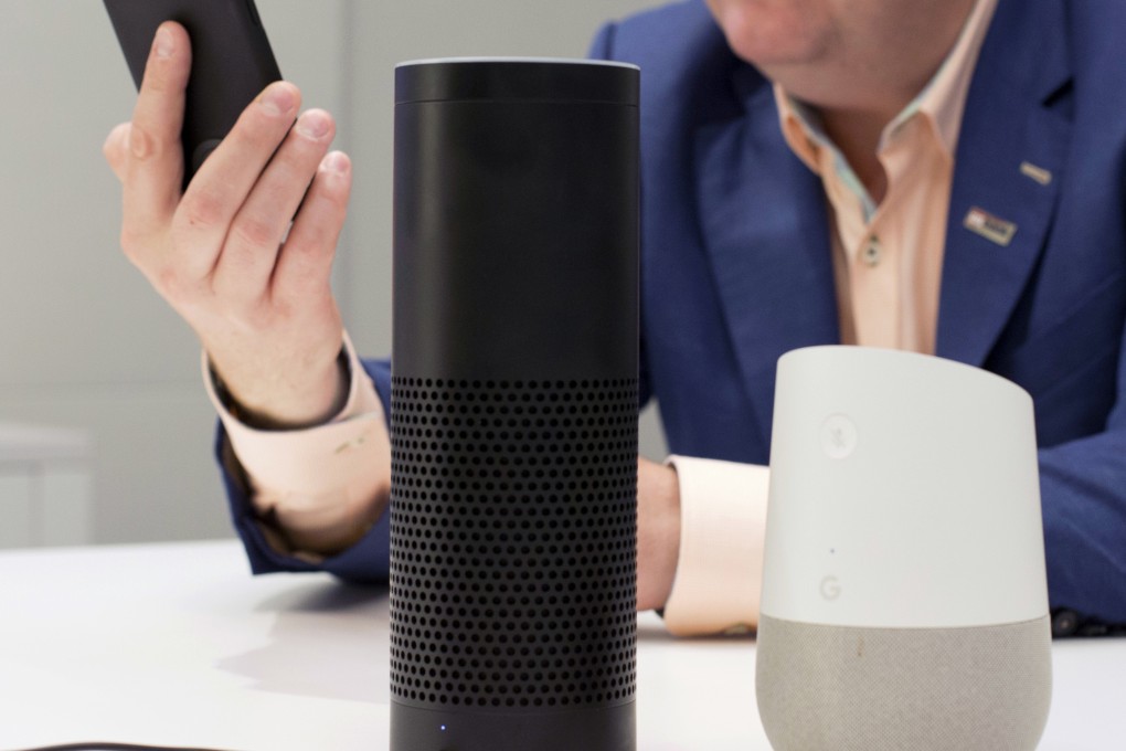 An Amazon Echo, left, and a Google Home smart speaker, right, are displayed in New York. File photo: AP