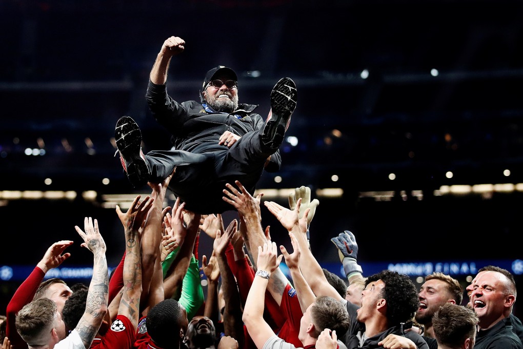 Liverpool manager Juergen Klopp is thrown in the air by his players as they celebrate after winning the 2019 Uefa Champions League Final. Photo: Reuters